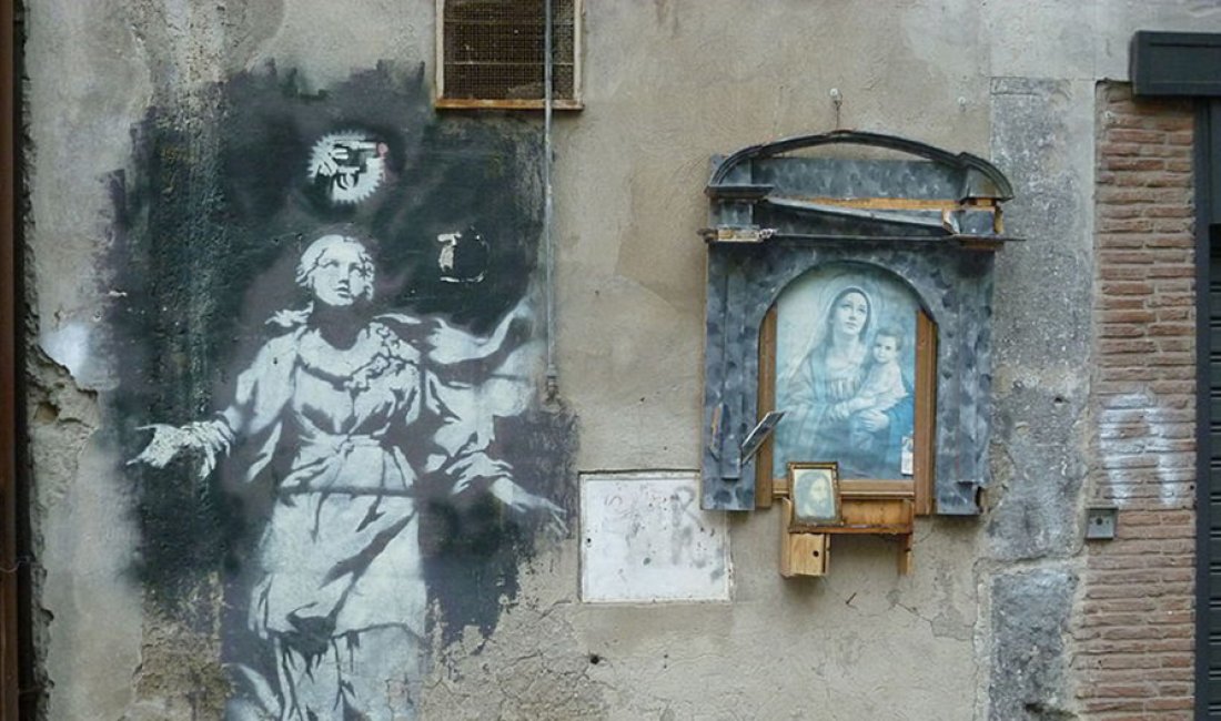 Madonna con la pistola di Banksy. Credits Antoine Pitrou / Wiki Commons